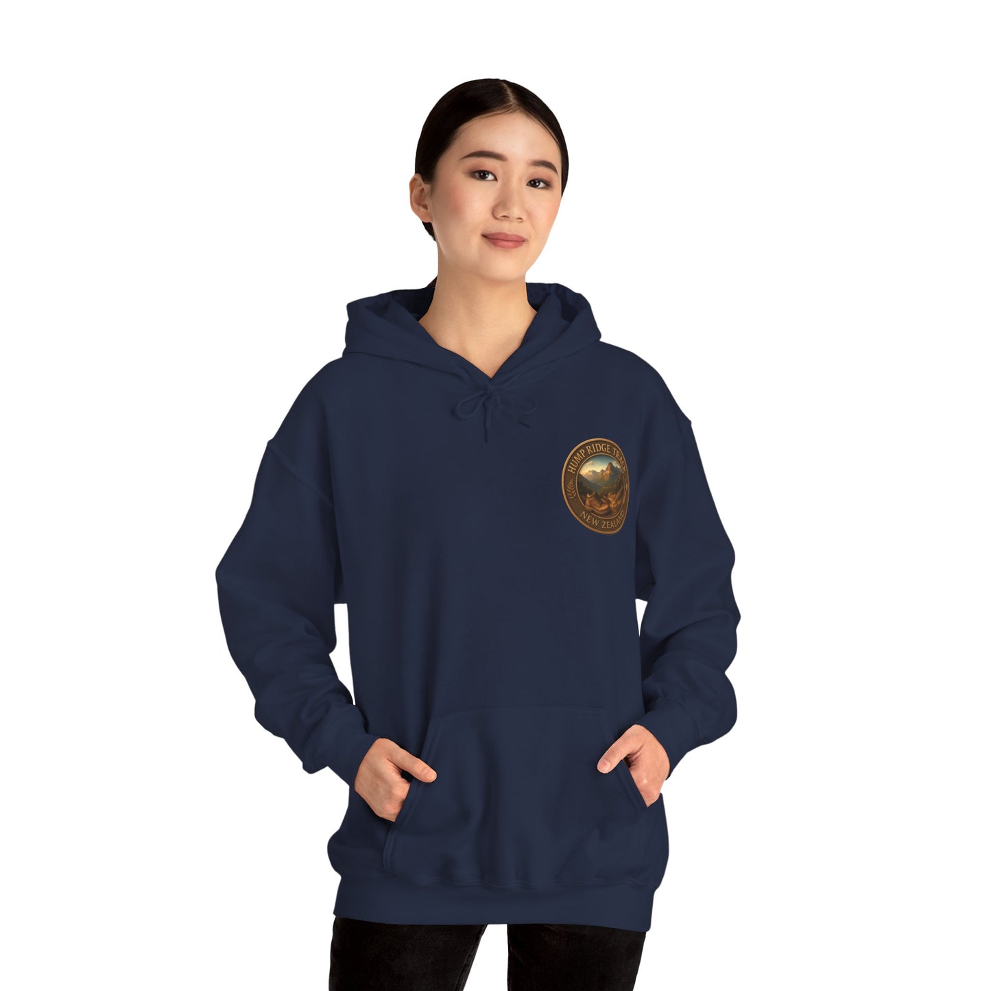Person wearing a navy blue Hump Ridge Track hoodie with a logo on a white background