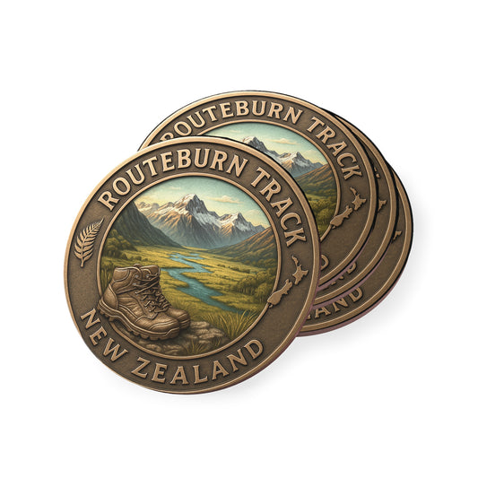 Bronze coin with Routeburn Track New Zealand design on a white background