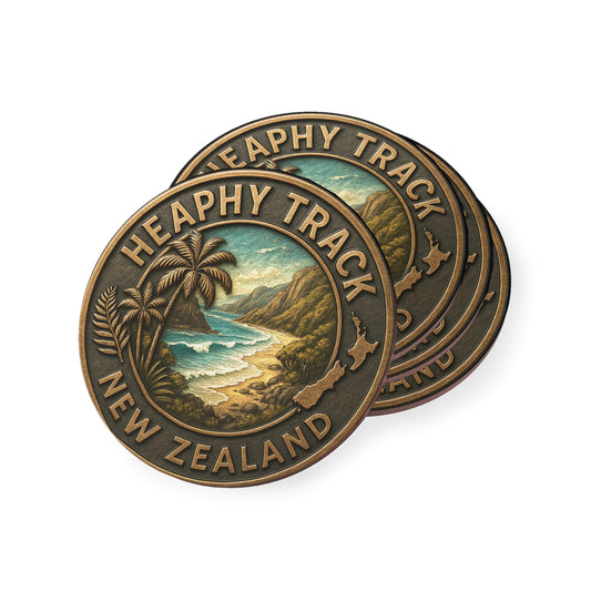 Two Heaphy Track New Zealand coins stacked on a white background