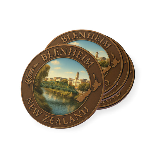 Two round bronze-colored coasters with Blenheim, New Zealand design on a white background