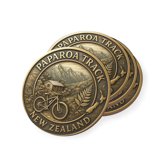 Two bronze coins with Paparoa Track New Zealand design on a white background