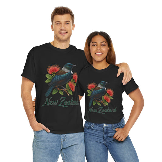 Two people wearing black t-shirts with a bird and flower design and 'New Zealand' text.