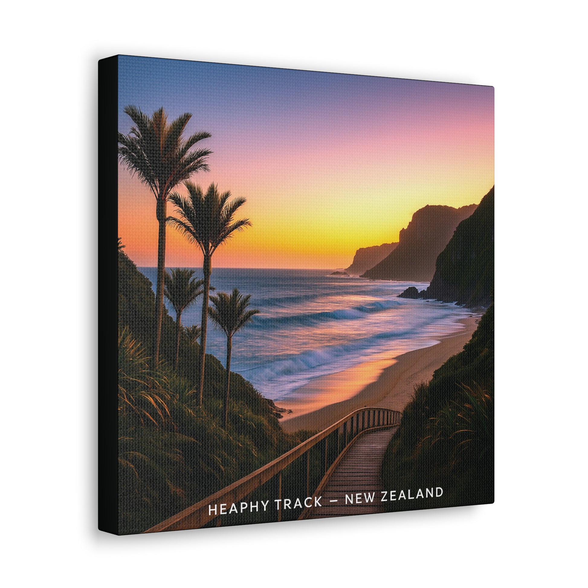 Canvas print of a sunset over a beach with palm trees and a wooden walkway, labeled 'Heaphy Track, New Zealand'.