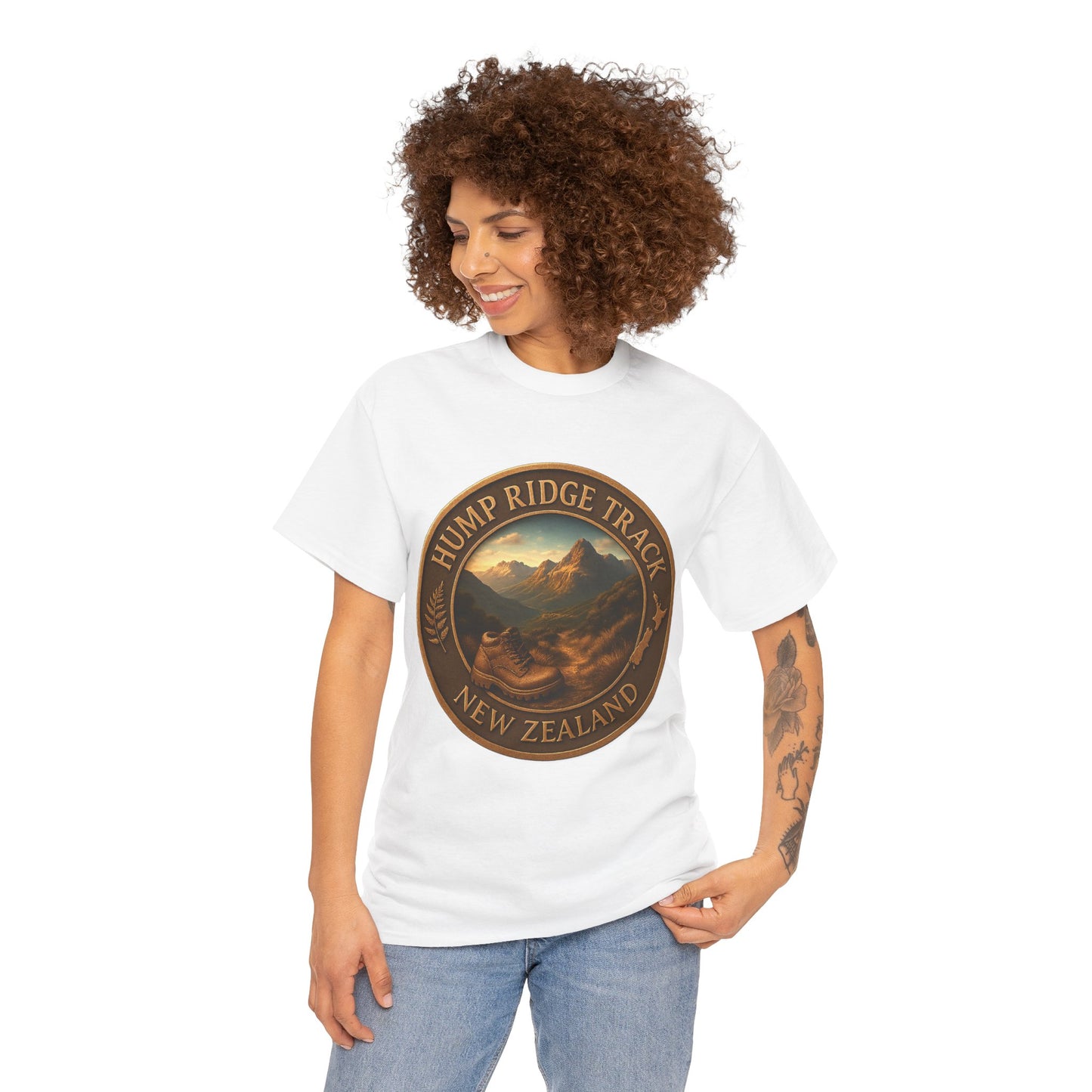 Woman wearing a white t-shirt with 'Hump Ridge Track, New Zealand' design on a white background