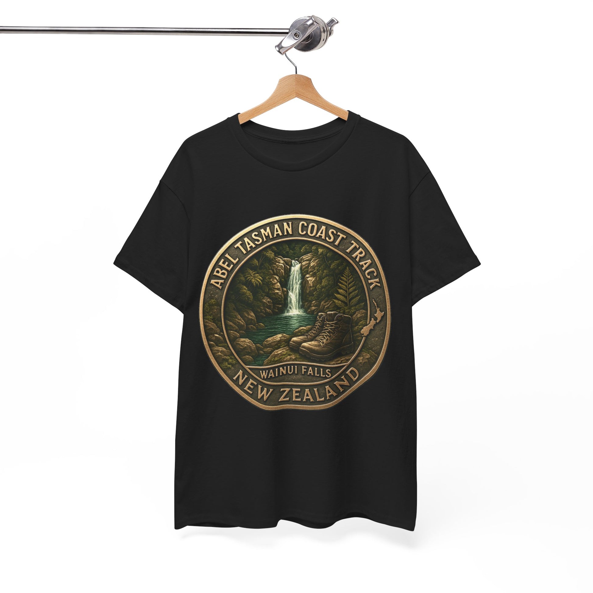 Black t-shirt with Abel Tasman Coast Track design on a hanger against a white background