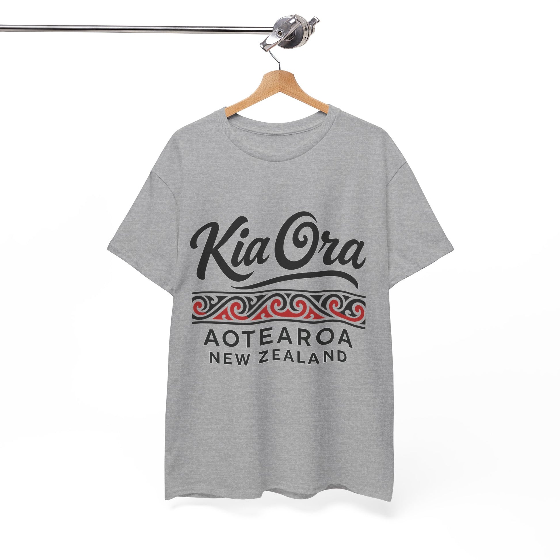 Gray t-shirt with 'Kia Ora Aotearoa New Zealand' text on a hanger against a white background