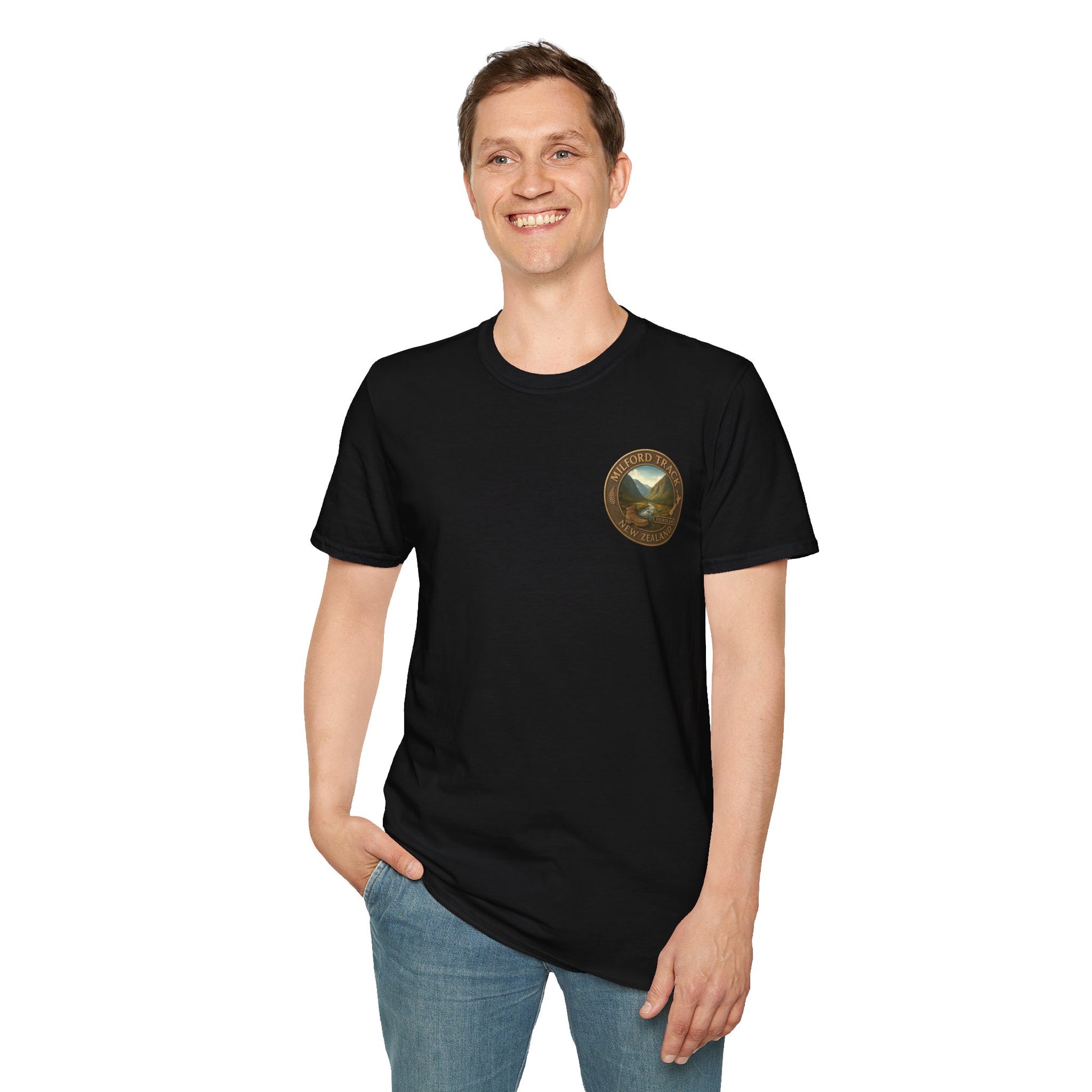 Man wearing a black New Zealand Great Walks Milford Track t-shirt with a logo on a white background