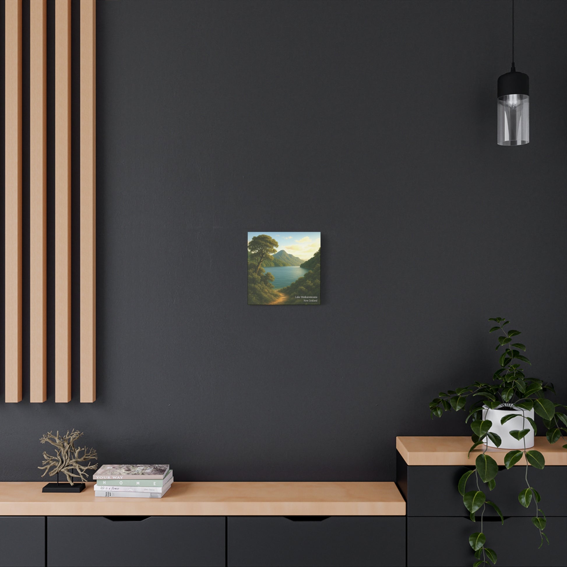 Modern interior with a dark wall, wooden shelf, and decorative items.