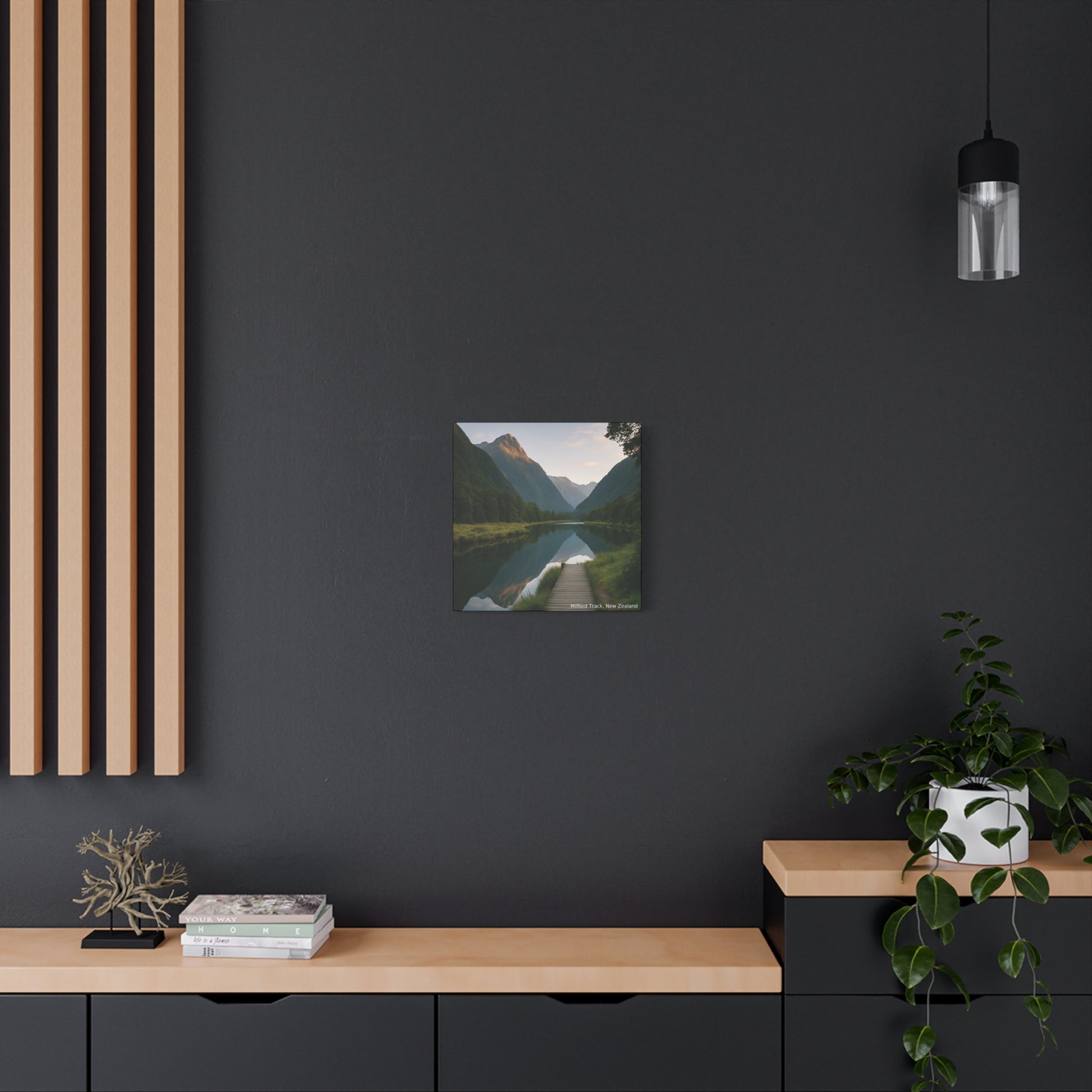 Modern interior with a dark wall, wooden shelf, and landscape painting.