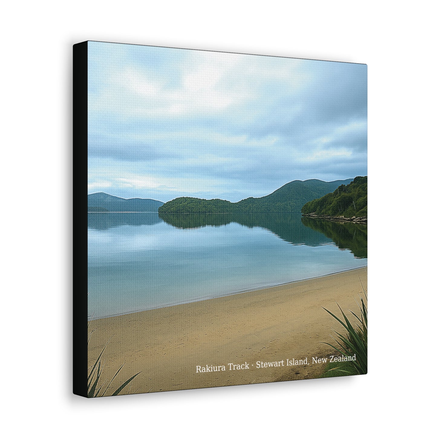 Rakiura Track Canvas print of a scenic view with a lake, beach, and mountains.
