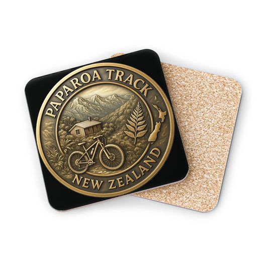 Bronze coin with Paparoa Track New Zealand design on a black and cork coaster.