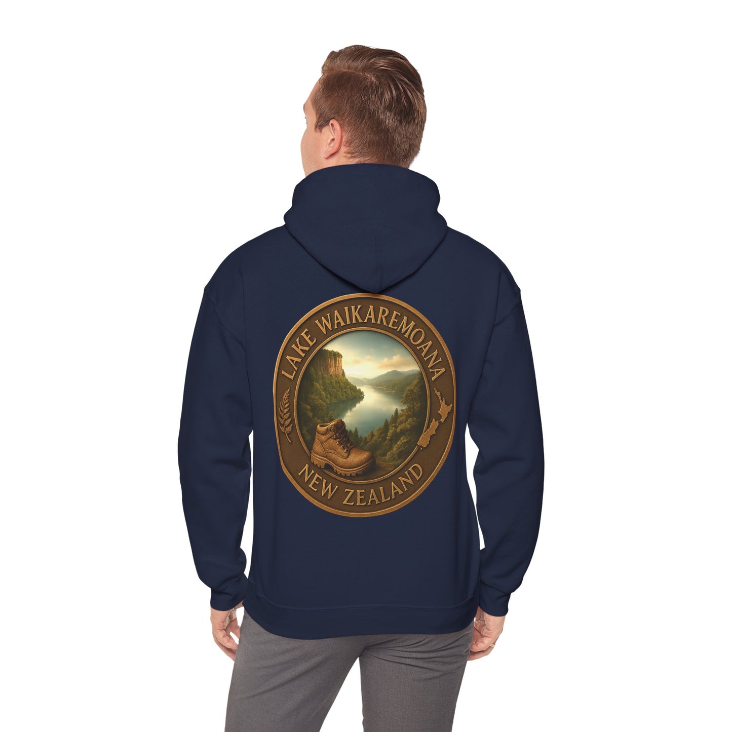 Navy blue Lake Waikaremoana Track hoodie with a scenic design on the back, worn by a person.