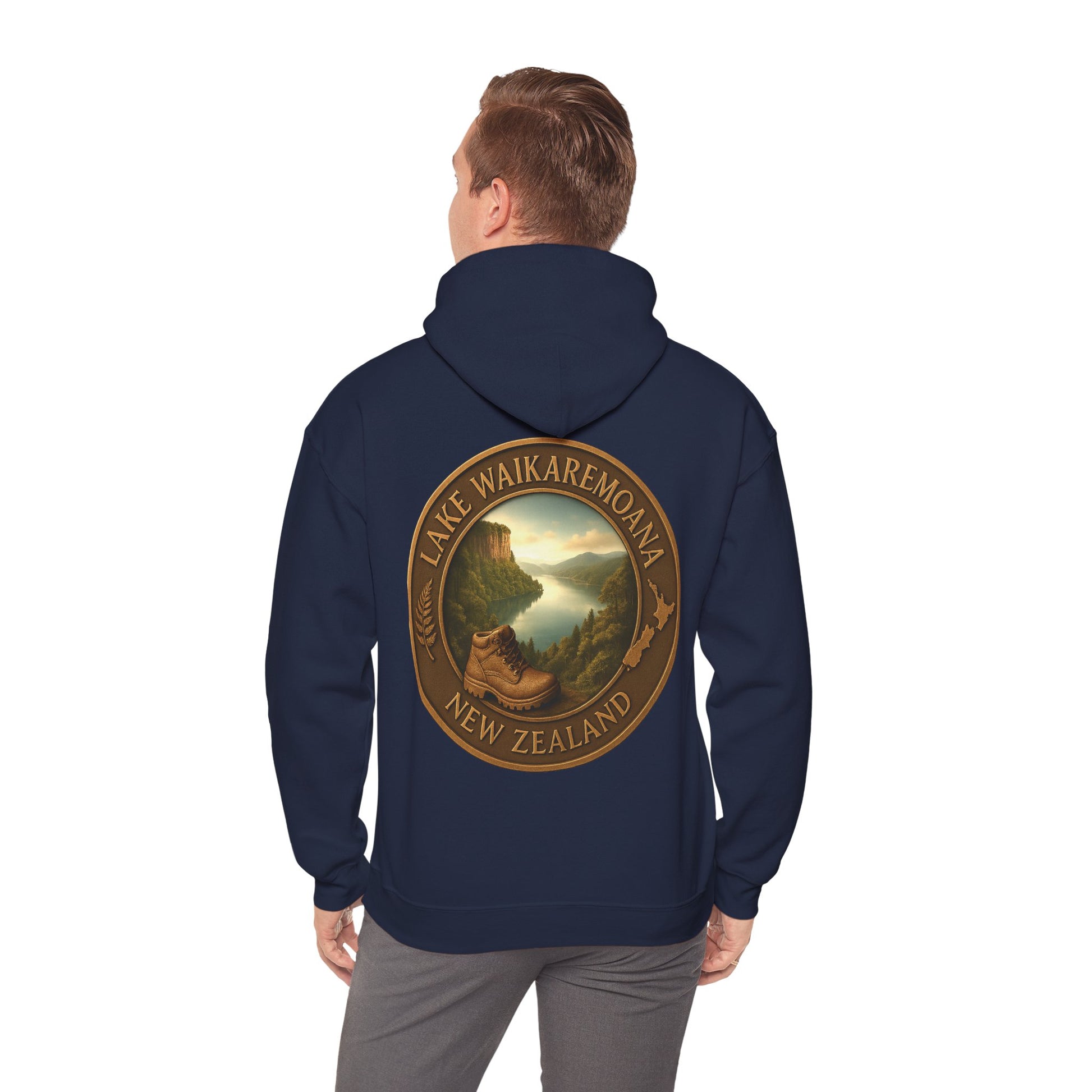 Navy blue Lake Waikaremoana Track hoodie with a scenic design on the back, worn by a person.