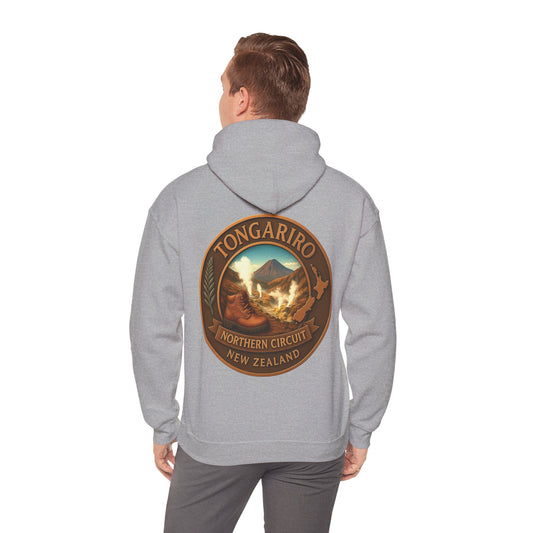 Person wearing a gray hoodie with Tongariro Northern Circuit New Zealand design on the back.