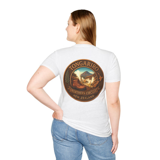 Person wearing a white Tongariro Northern Circuit t-shirt with a scenic design on the back, standing against a plain background.