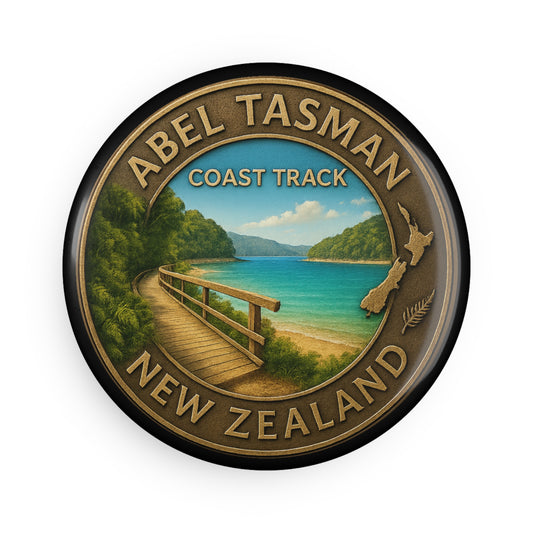 Round badge with Abel Tasman Coast Track New Zealand design featuring a wooden walkway over water.