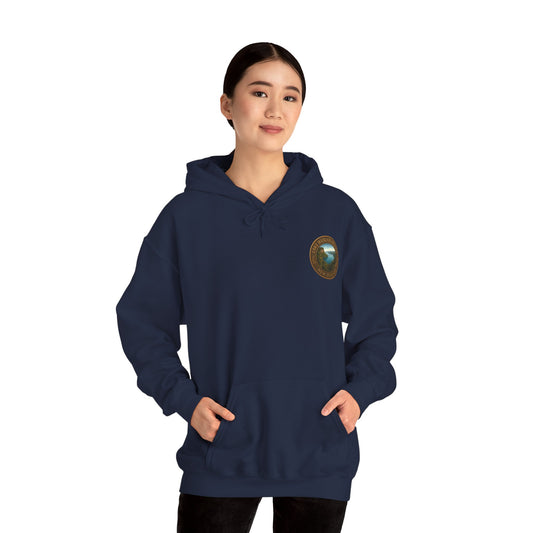 Person wearing a navy blue Lake Waikaremoana Track hoodie with a logo on the chest against a white background
