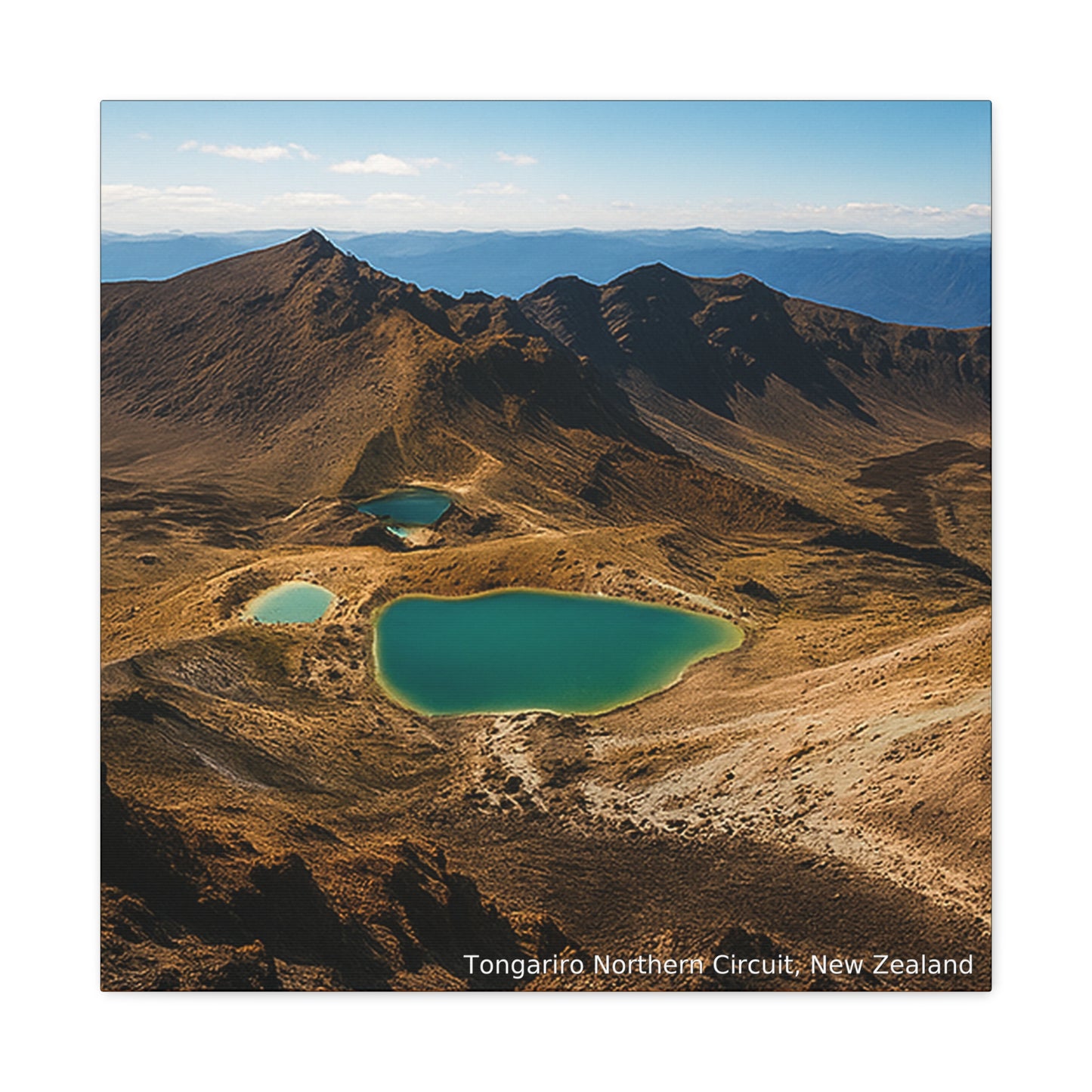 Scenic view of mountainous landscape with turquoise lakes in Tongariro Northern Circuit, New Zealand.