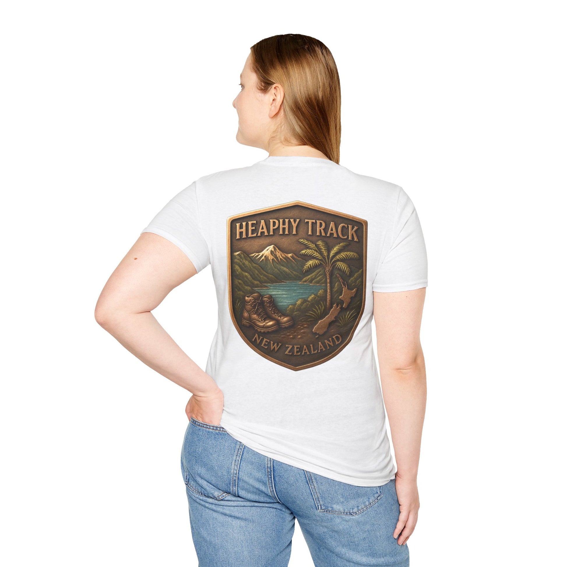 Person wearing a white Heaphy Track t-shirt with a 'Heathy Track New Zealand' logo on the back.