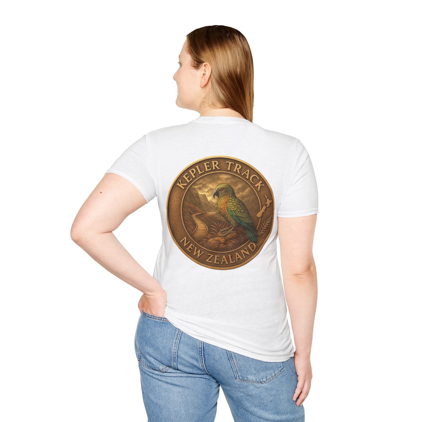 Person wearing a white Kepler Track t-shirt with a 'Kepler Track, New Zealand' design on the back.