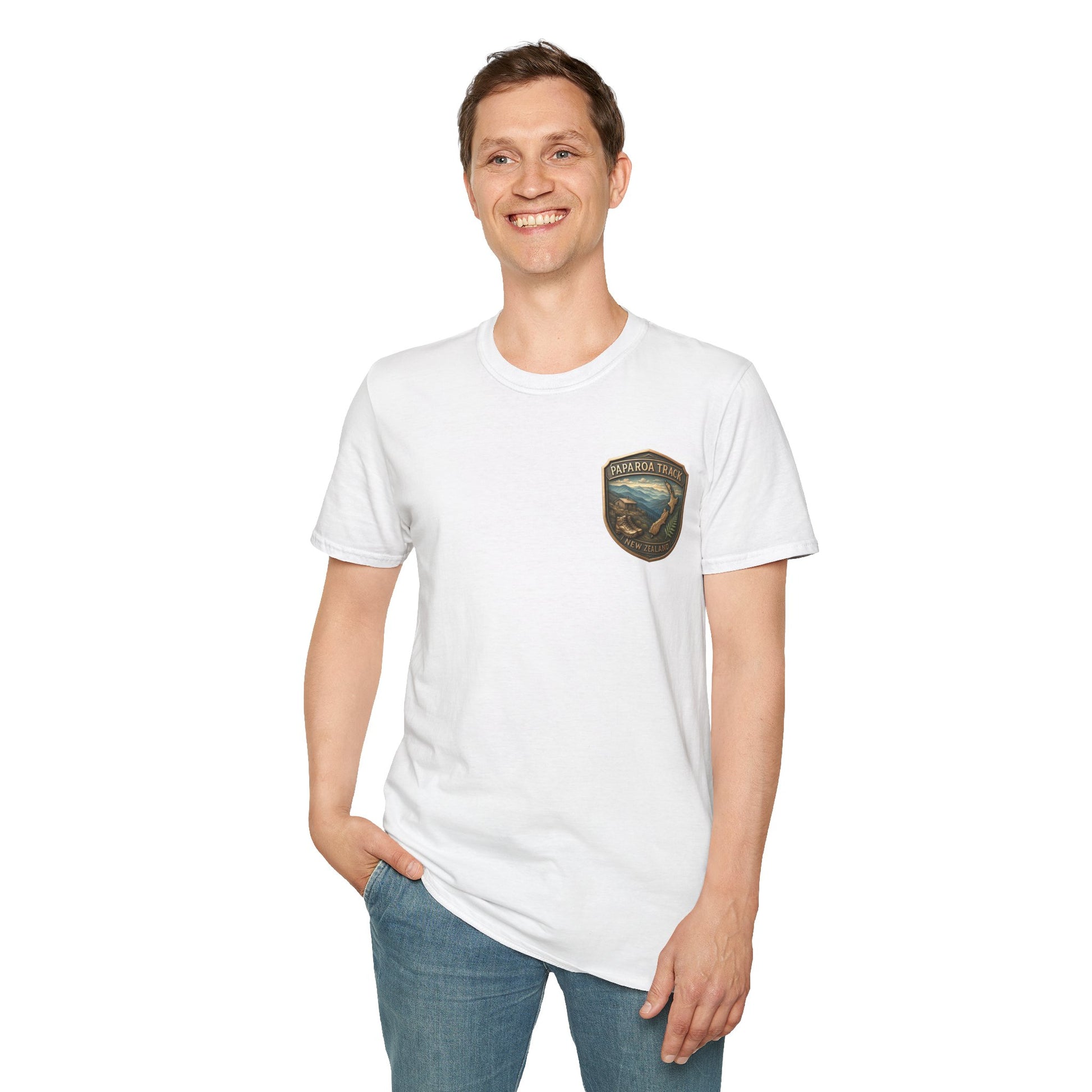 Person wearing a white Paparoa Track t-shirt with a logo on a white background