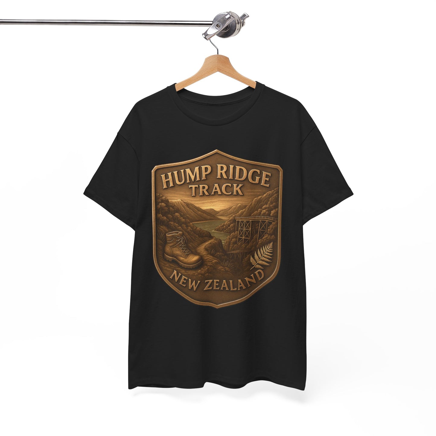 Black t-shirt with 'Hump Ridge Track, New Zealand' design on a hanger against a white background