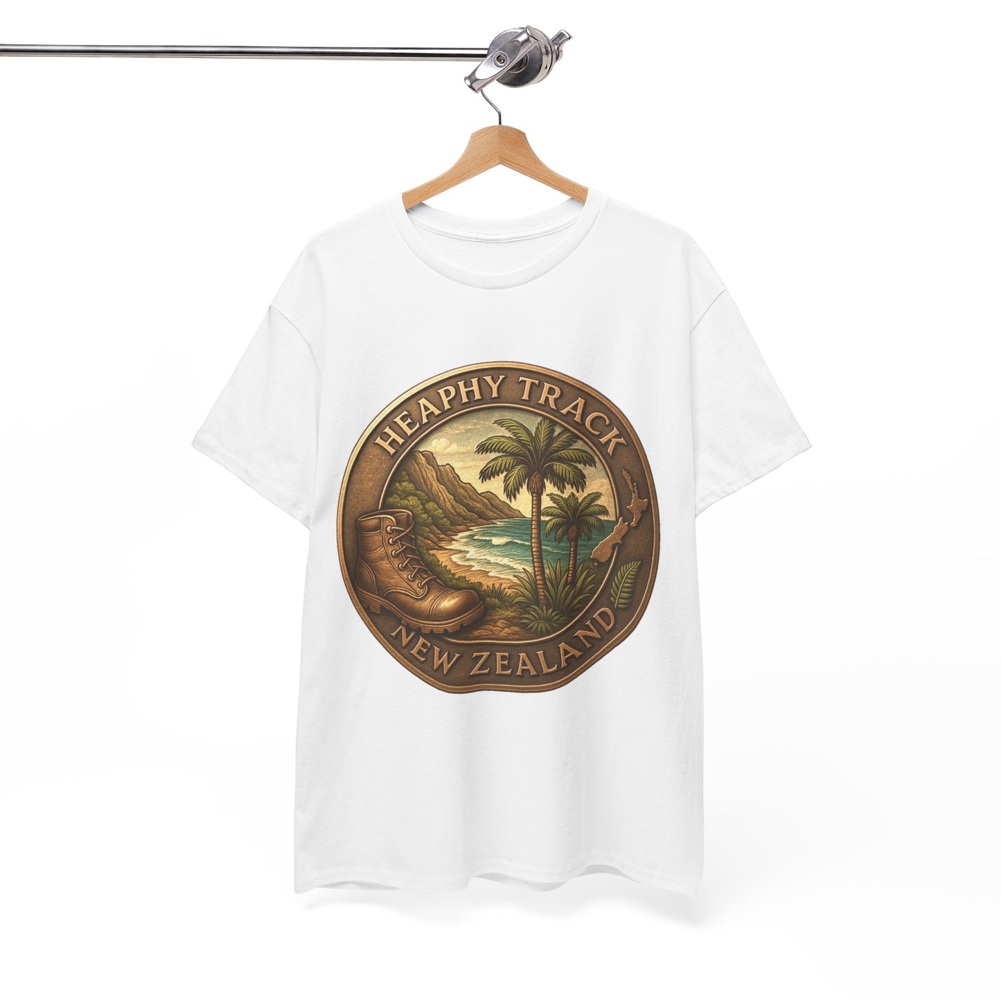 White t-shirt with a tropical design and 'Heathy Track New Zealand' text on a hanger against a white background.