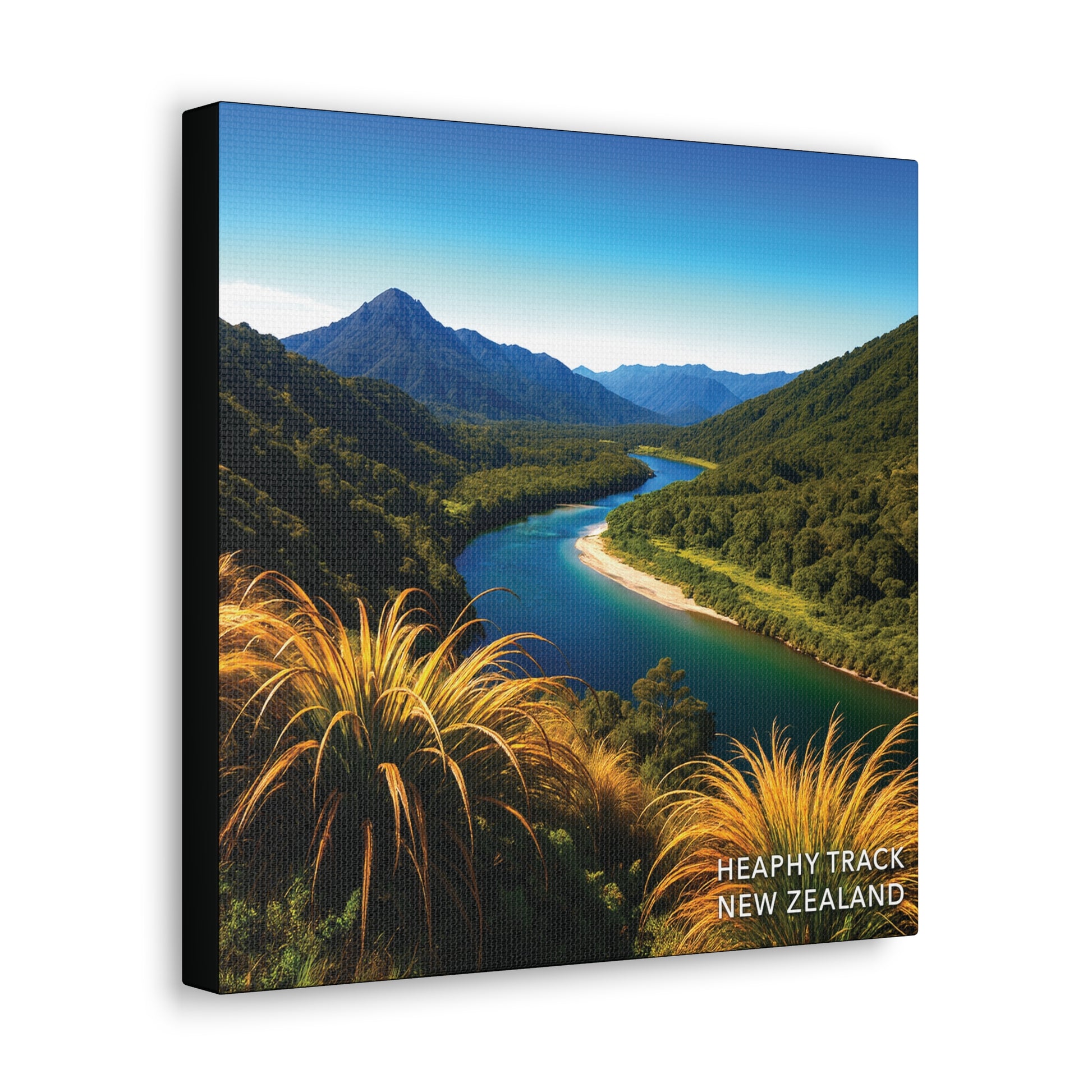 Heaphy Track Canvas print of a scenic view with mountains, river, and grasses, featuring 'Heaphy Track New Zealand' text.