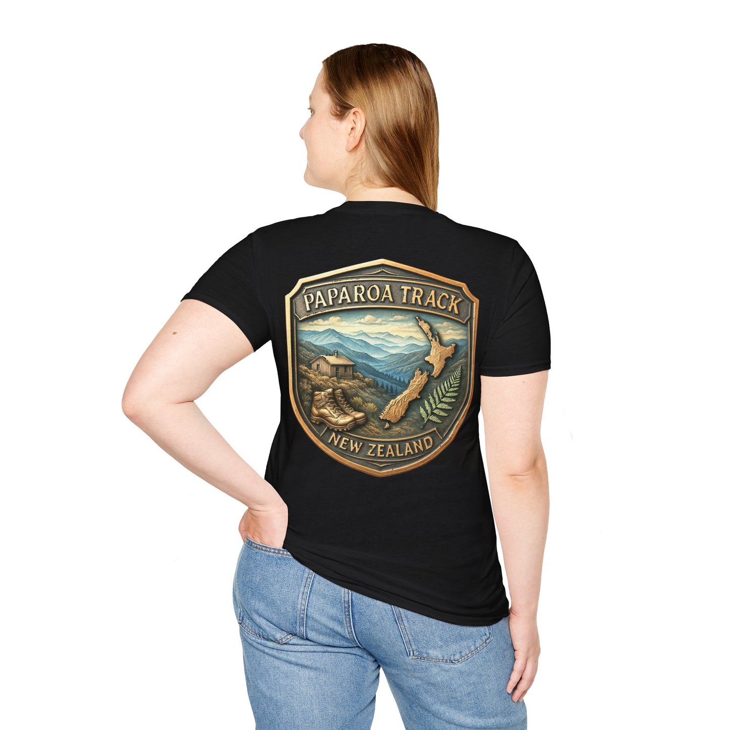 Person wearing a black t-shirt with Paparoa Track New Zealand design on the back