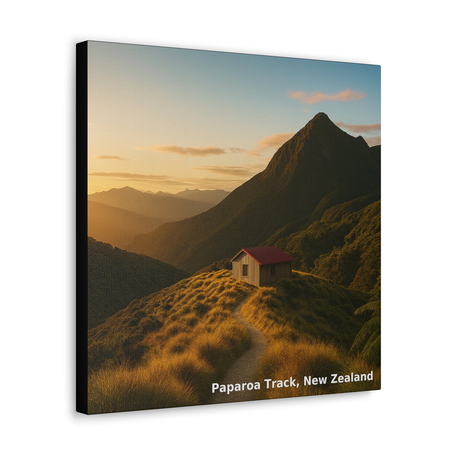 Canvas print of a mountain landscape with a cabin at sunset, labeled 'Paparoa Track, New Zealand'.