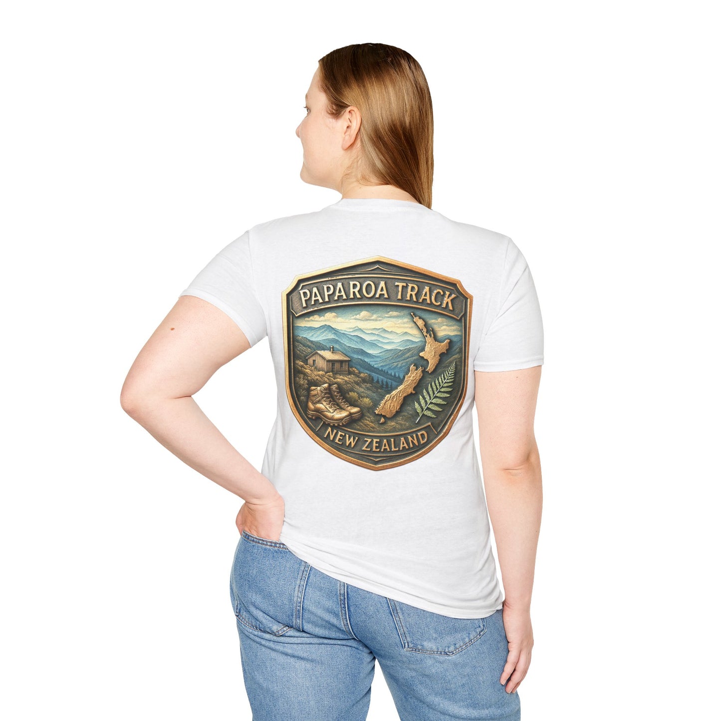 Person wearing a white t-shirt with a Paparoa Track New Zealand design on the back.