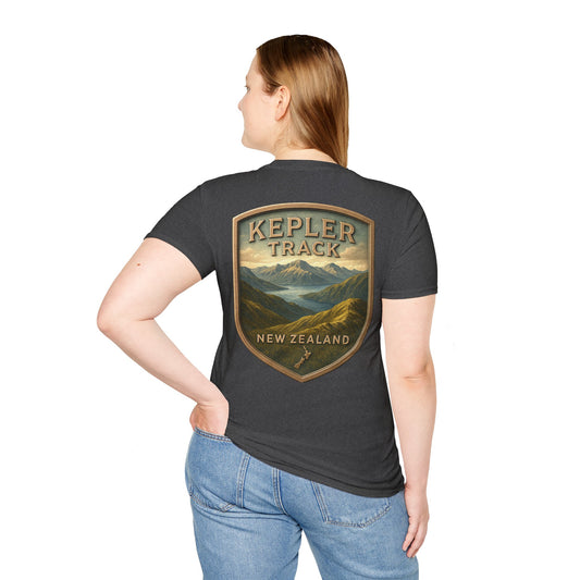 Person wearing a black t-shirt with 'Kepler Track, New Zealand' design on the back.