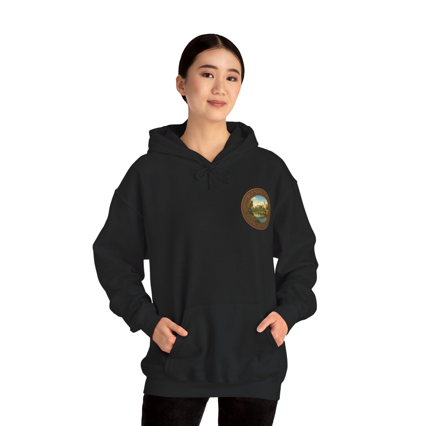 Person wearing a black hoodie with a logo on a white background