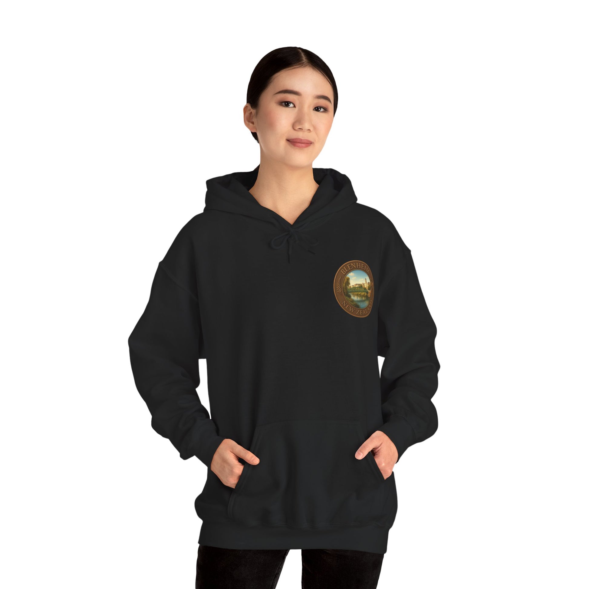 Person wearing a black hoodie with a logo on a white background