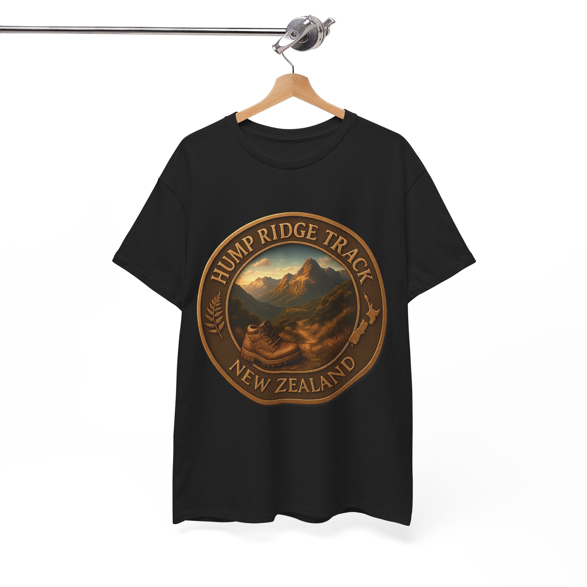 Black t-shirt with 'Hump Ridge Track, New Zealand' graphic on a hanger against a white background