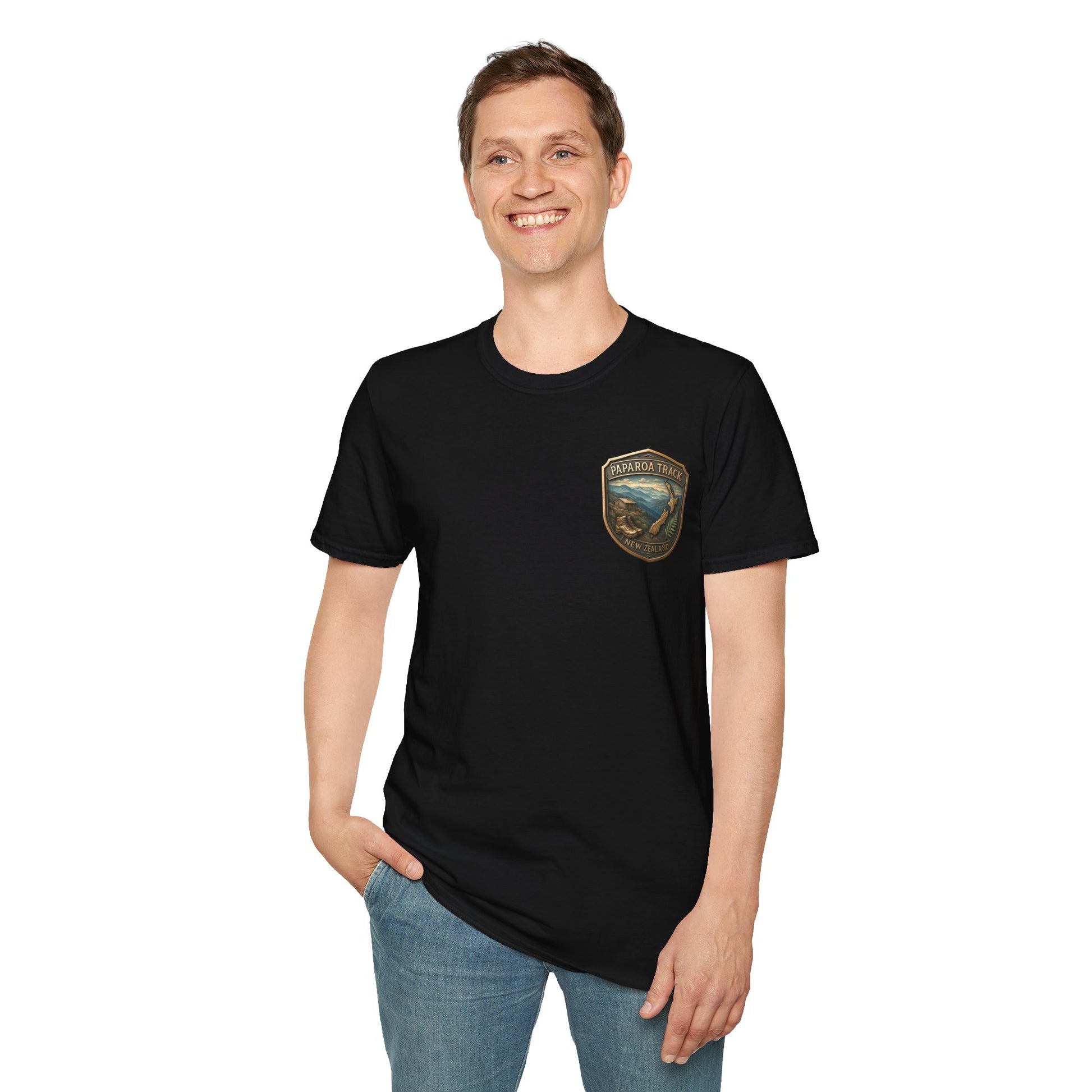 Person wearing a black Paparoa Track t-shirt with a logo on a white background