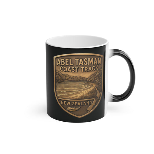 Black mug with 'Abel Tasman Coast Track, New Zealand' design on a white background