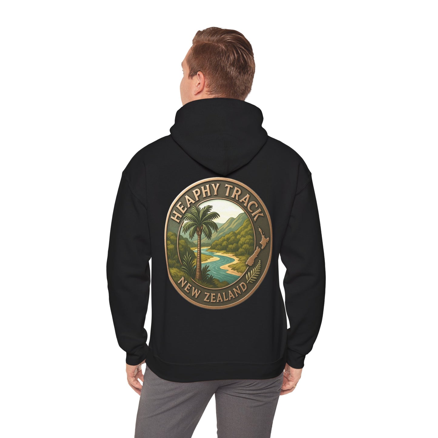 Person wearing a black hoodie with a 'Heaphy Track New Zealand' design on the back.
