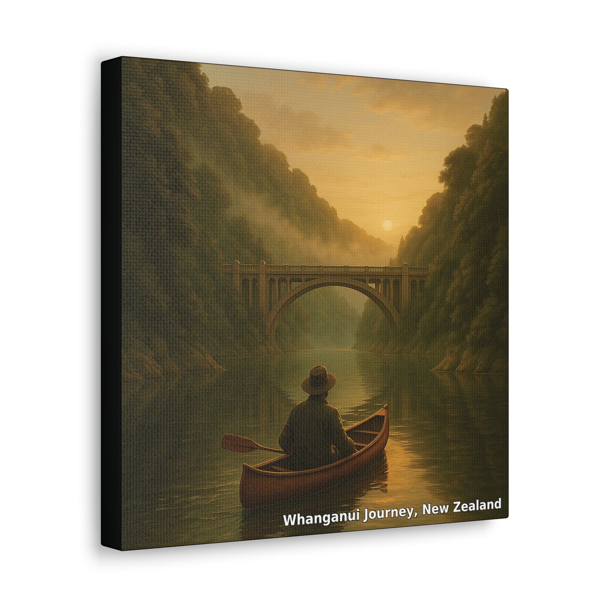 Man in a canoe on a river with a bridge and trees in the background, labeled 'Whanganui Journey, New Zealand'.
