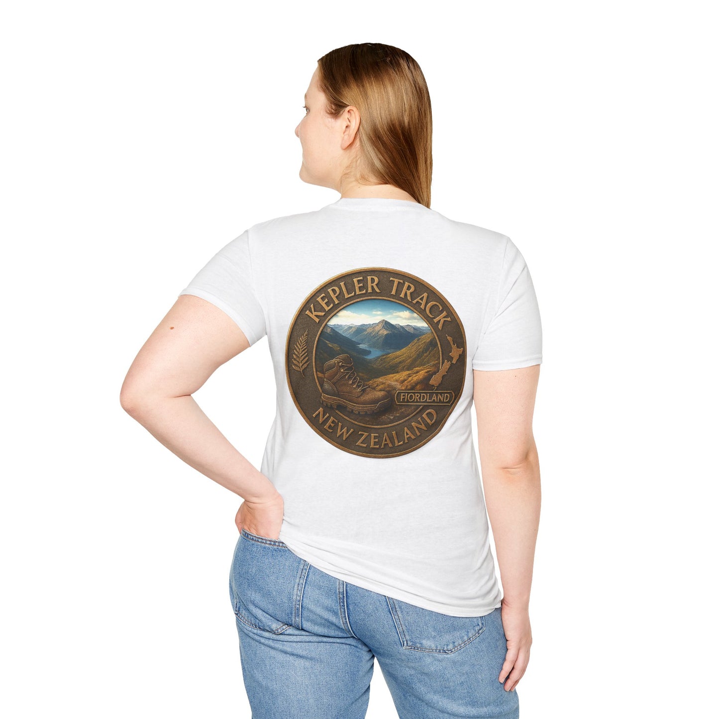 Person wearing a white t-shirt with a 'Kepler Track New Zealand' design on the back.