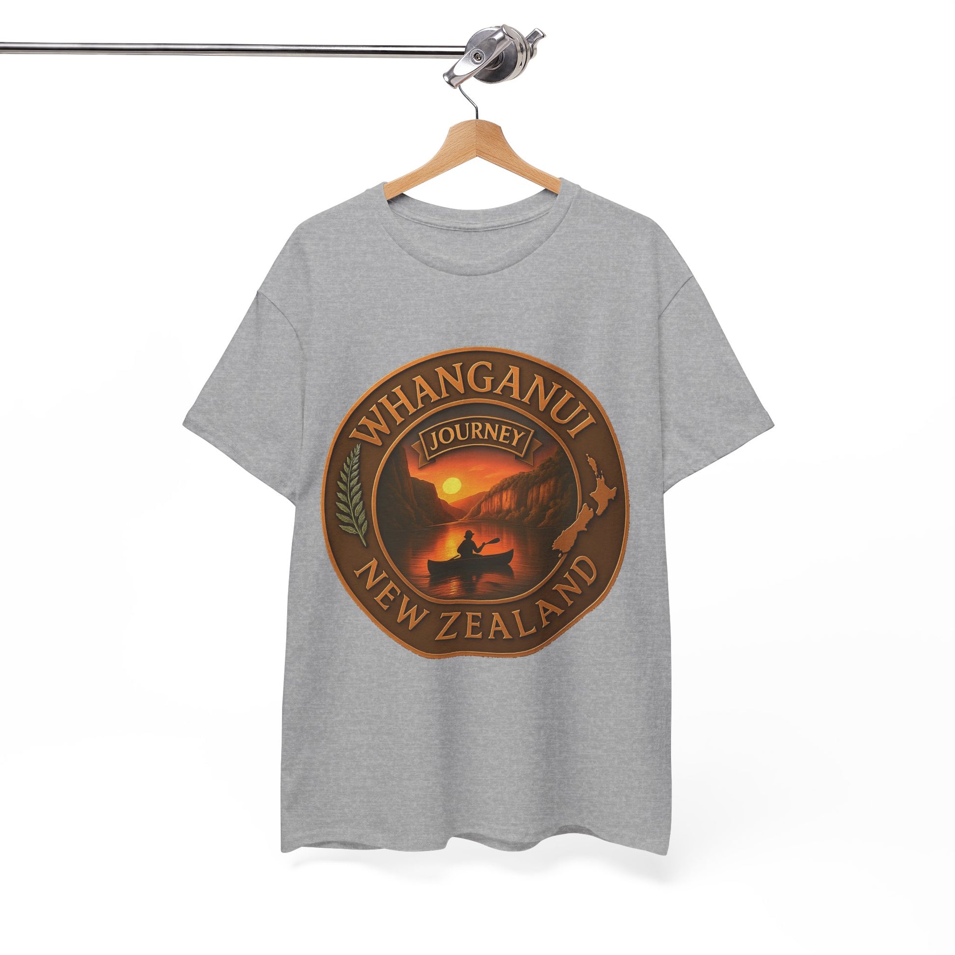 Gray t-shirt with a 'Whanganui Journey New Zealand' design on a hanger against a white background