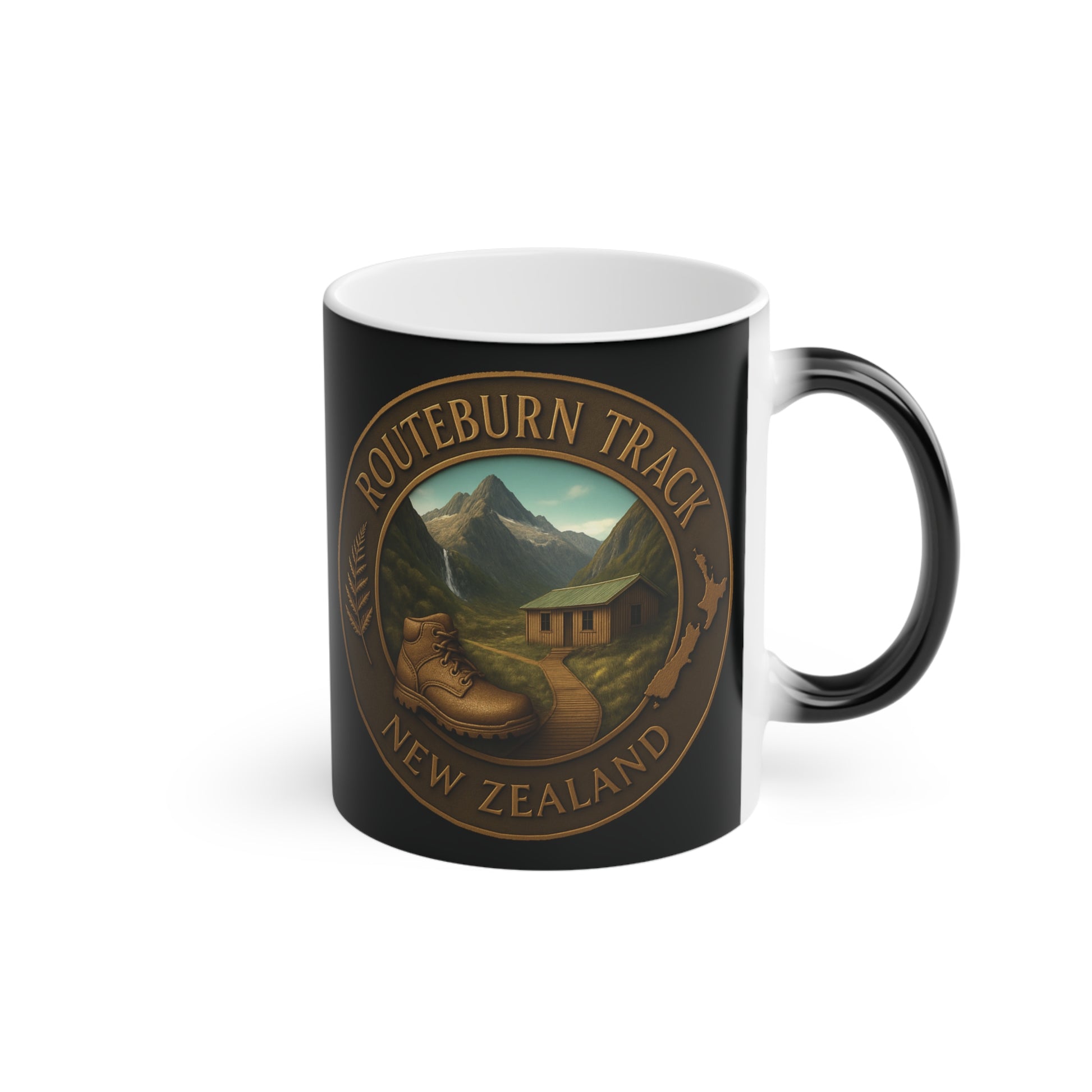 Black mug with 'Routeburn Track New Zealand' design featuring a mountain and cabin.