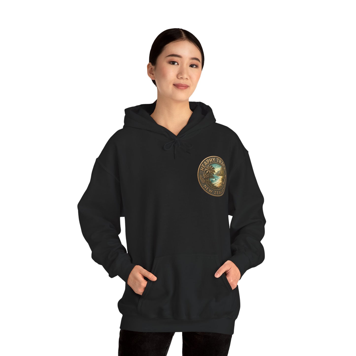 Person wearing a black Heaphy Track hoodie with a logo on a white background