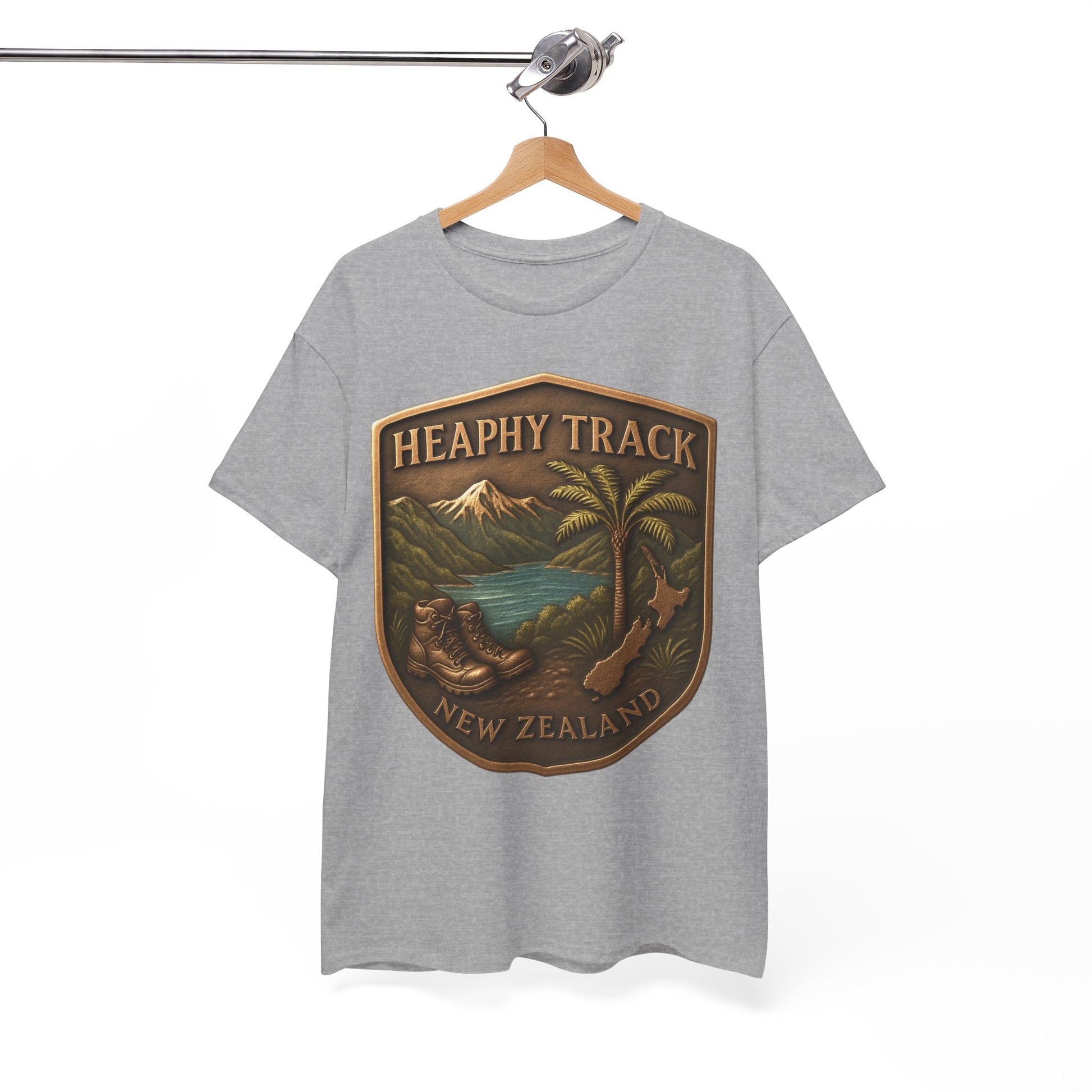 Gray t-shirt with a 'Heaphy Track New Zealand' graphic on a hanger against a white background
