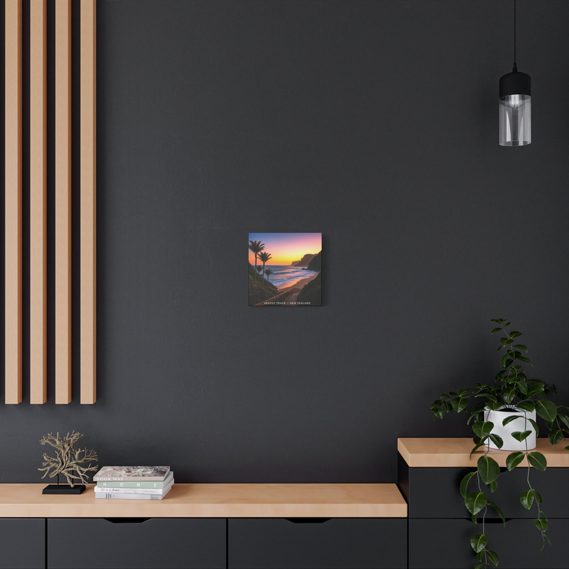Heaphy Track Modern interior with a dark wall, wooden shelf, and decorative items.