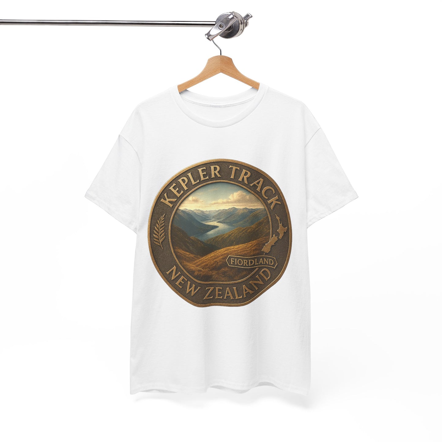White t-shirt with a 'Kepler Track, New Zealand' graphic on a hanger against a white background