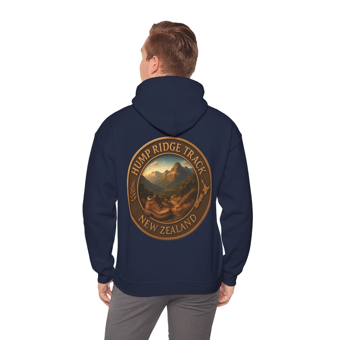 Navy blue Hump Ridge Track hoodie with a mountain graphic and text on the back, worn by a person.